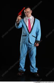 MIKAEL STANDING POSE WITH RED PISTOL